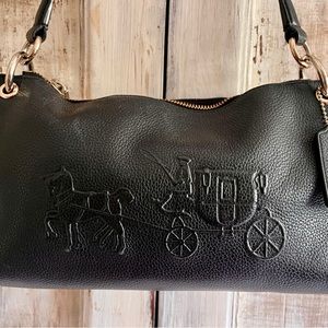 Women’s Coach black purse.  11 inches wide/7 inches high/ 2.5 inches deep.
